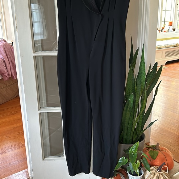 Black “evening” jumpsuit with elegant satin lapel. Missing fabric belt. - Picture 2 of 7